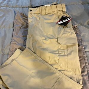 Brand new with tags, Elbeco concealed zipper tactical pants. Size 46R.